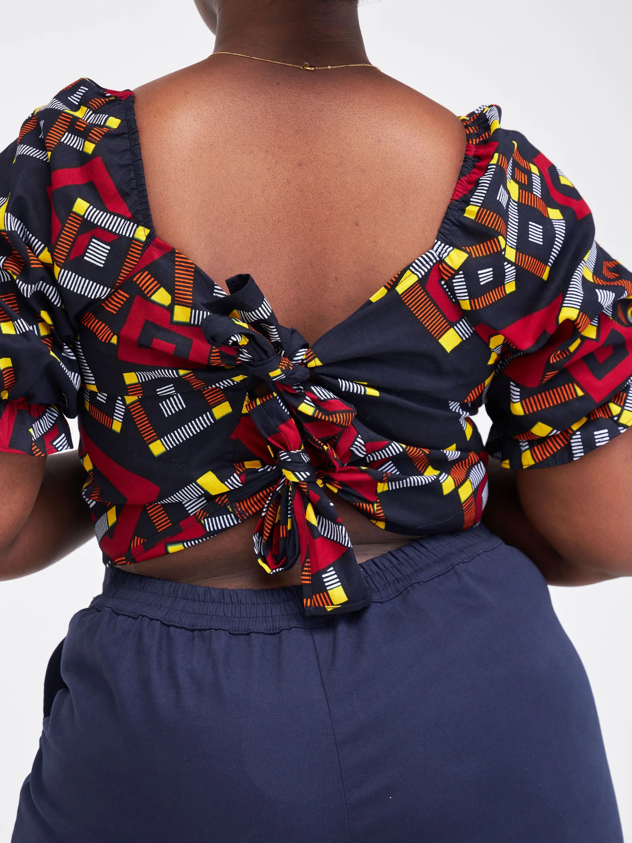 Safari Anga Puffy Short Sleeve Tie Top - Navy Blue / Orange Ankara Print